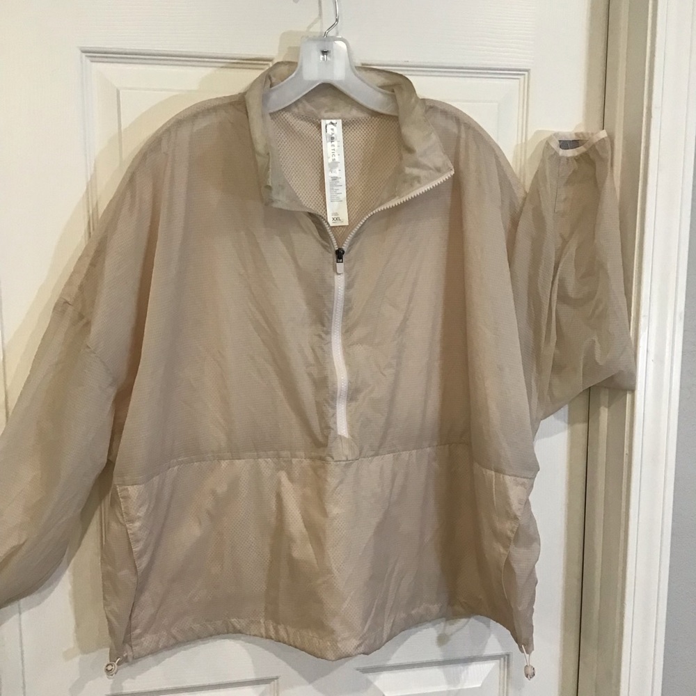 Fabletics women’s crop windbreaker jacket, 1/2 zip, cream color size 2XL